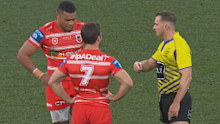 Moses Suli is cautioned by the ref.