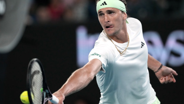 Alexander Zverev of Germany plays a backhand return to Alex Michelsen of the US during their third round match at the Australian Open.