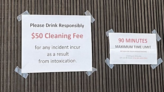 Sign charging customers $50 vomit fee in Home Plate, San Francisco