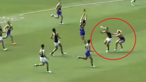 Reuben Ginbey appears to shove Sam Lalor under the contest.