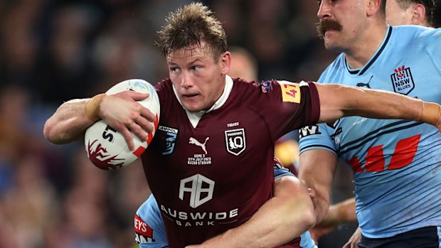 Harry Grant of the Maroons is tackled during game three of the 2024 State of Origin series.