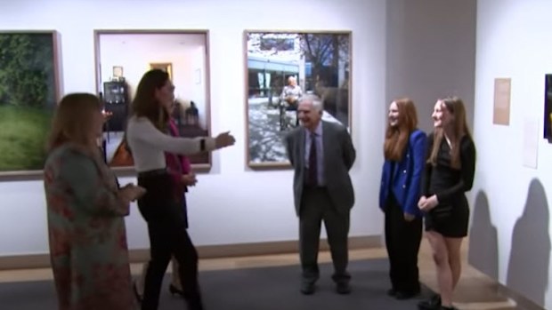 At first he seemed uncertain about hugging the royal.
