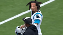 Anderson leaves the field against the Rams.