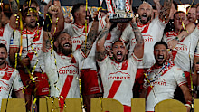 Hull KR's Elliot Minchella (centre) lifts the trophy as his team celebrate after the Betfred Super League Grand Final.