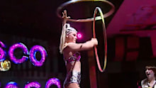 The show includes hula hooping, roller skating, and aerial acrobatics.