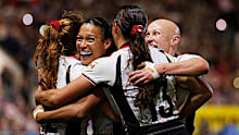 Canada players celebrate at the final whistle.