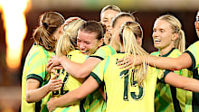 Kahli Johnson of Australia celebrates scoring a goal.