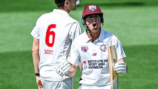 Marnus Labuschagne of the Queensland Bulls celebrates bringing up his century.