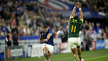France's Thomas Ramos has his try conversion kick charged down by South Africa's Cheslin Kolbe.