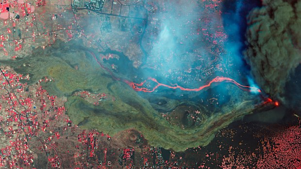 Satellite photo from Planet Labs Inc. shows lava and ash from a volcano on the Canary island of La Palma, Spain. 