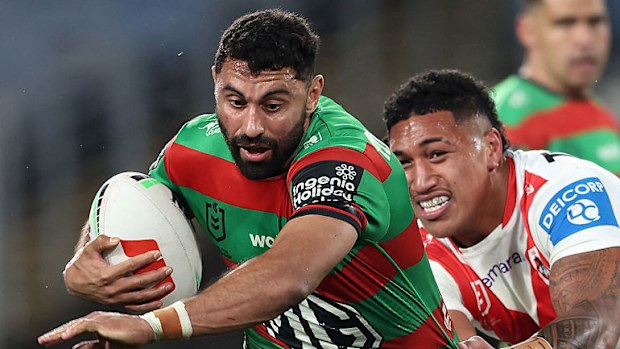 Alex Johnston of the Rabbitohs is tackled.