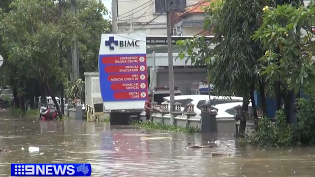 Buildings have been washed away into river rapids key roads around the international airport remain closed leaving tourists stranded.