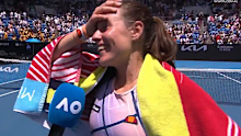 Kim Birrell being interviewed on court. 