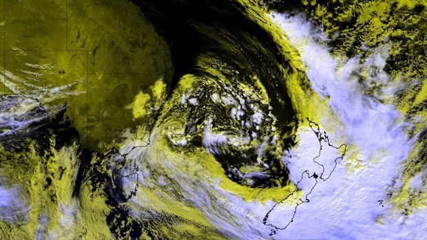 The weather system that brought cyclone-like winds and rain can be seen from space as it moves away from Australia. As the system moves away from the east coast, it's developing a colossal low-pressure complex covering most of the Tasman Sea. 