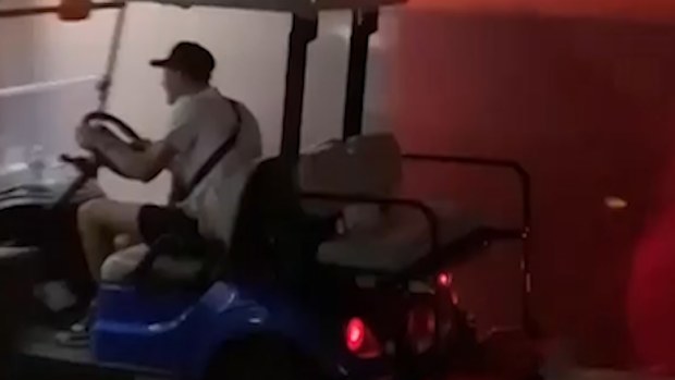 A security guard's buggy was taken from the scene by an unknown man.