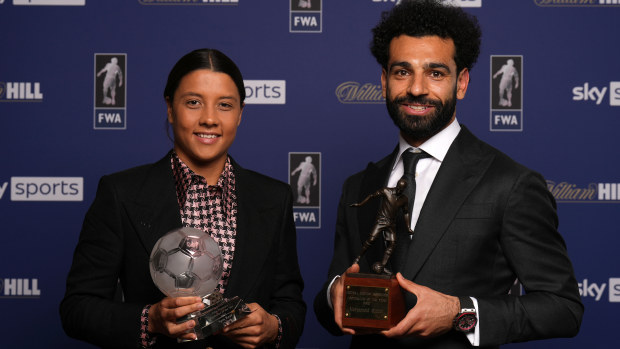 Chelsea's Sam Kerr and Liverpool's Mohamed Salah pose with their FWA Player of the Year Awards.