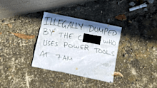 Neighbour power tool note blurred