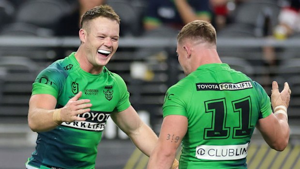 Ethan Strange and Hudson Young of the Raiders celebrate winning the round one NRL match between the Canberra Raiders and the New Zealand Warriors.