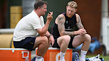England captain Ben Stokes speaks with director of cricket Rob Key.