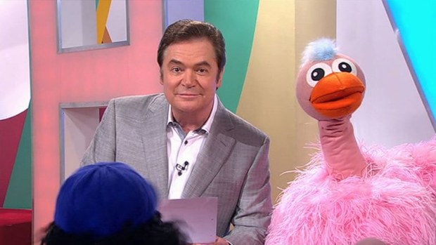 John Blackman is the voice behind Dicky Knee on Hey Hey It's Saturday. 