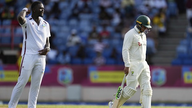 Usman Khawaja trudges off.