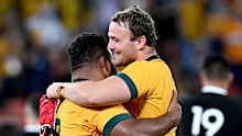 Harry Wilson and Taniela Tupou of the Wallabies celebrate victory.