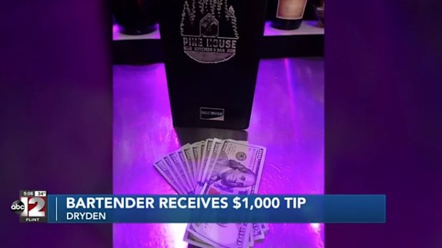 Two men left a tip of $1000 in $100 notes for Michigan bartender Dawn