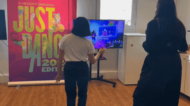 9PR: Two women dance and play Just Dance 2024
