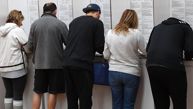Victorians at the ballot box this morning.