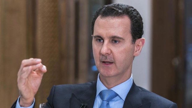 Syrian President Bashar Assad speaks during an interview with Iran's Al Alam TV, in Damascus, Syria