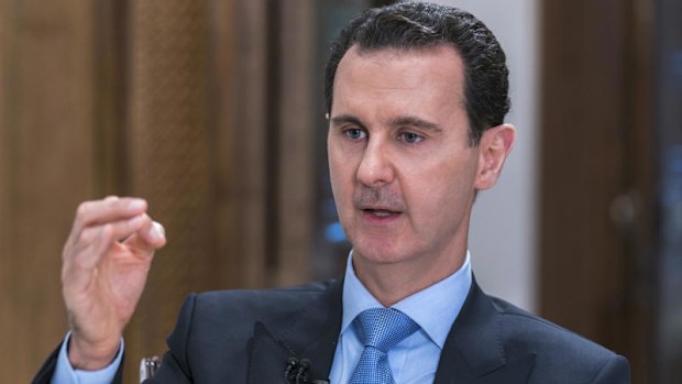 Syrian President Bashar Assad speaks during an interview with Iran's Al Alam TV, in Damascus, Syria