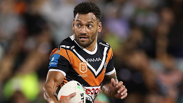 Apisai Koroisau of the Wests Tigers makes a break.