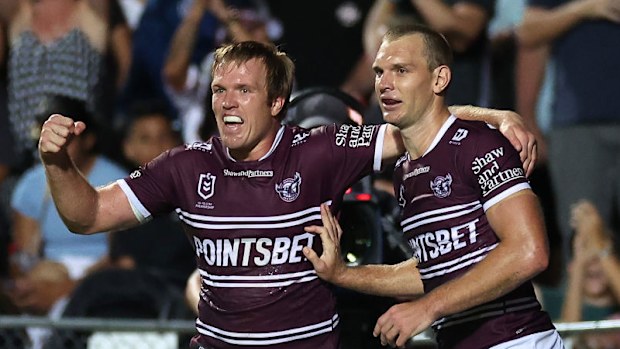 Tom Trbojevic (R) of the Sea Eagles celebrates with Jake Trbojevic of the Sea Eagles.