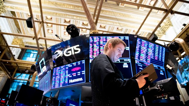 Traders work on the floor of the New York Stock Exchange 