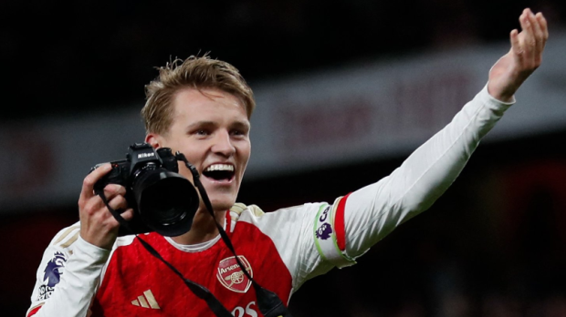 Arsenal captain Martin Odegaard celebrates after the win over Liverpool.