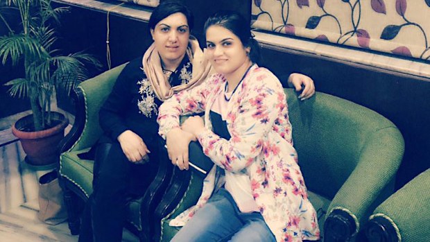 Lima, pictured with her sister Rana Haydari in India, where Lima received a scholarship to study.