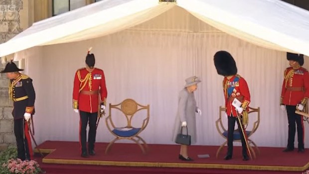 The Queen chats to the Duke of Kent at the conclusion of the ceremony.