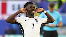 Bukayo Saka of England celebrates after scoring his penalty kick during the penalty shoot out during the UEFA EURO 2024 quarter-final match between England and Switzerland at Dusseldorf Arena on July 6, 2024 in Dusseldorf, Germany. (Photo by Crystal Pix/MB Media/Getty Images)