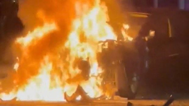An intersection in Sydney's inner west resembled a wrecking yard after a speeding driver slammed into four cars before bursting into flames.The crash in Five Dock around midnight last night was so intense emergency crews are stunned everyone involved was able to walk away.