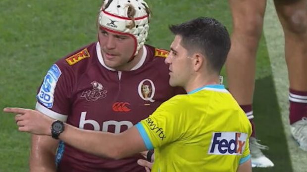 Referee Marcus Playle speaks to Fraser McReight.