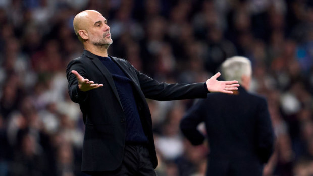 Pep Guardiola of Manchester City reacts.