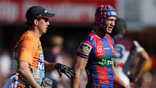 Kalyn Ponga leaves the field injured.