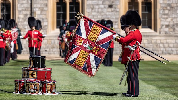 The new regimental colours of the 1st battalion Irish guards is paraded in the Quadrangle of Windsor Castle where they were presented to the regiment by Prince William, The Duke of Cambridge.  