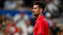 Novak Djokovic of Serbia reacts against Matthew Ebden of Australia in the Men's Singles first round match at Paris 2024.