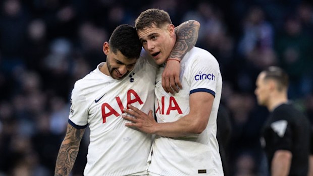 Tottenham Hotspur's Cristian Romero (left) celebrates victory with Micky van de Ven.
