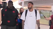 Tarryn Thomas arrives at Perth airport