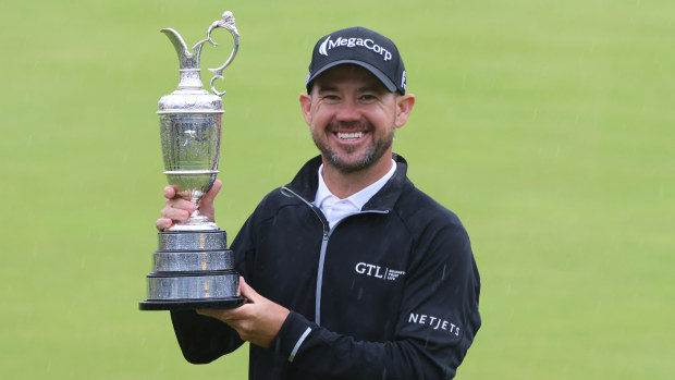 American Brian Harman holds the Claret jug after winning the 151st Open at Royal Liverpool Golf Club on July 23, 2023 in Hoylake, England. (Photo by MB Media/Getty Images)
