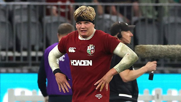 Henry Pollock of the British & Irish Lions walks off the field after being shown a yellow card.