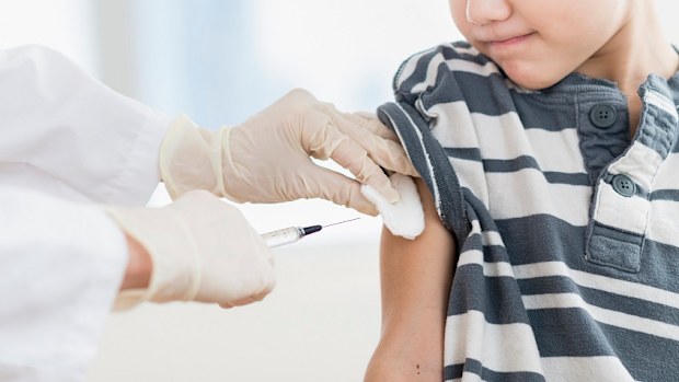 Boy receiving vaccination