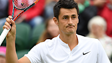 Bernard Tomic reacts during his men's singles first-round match against Fernando Verdasco at Wimbledon 2016.